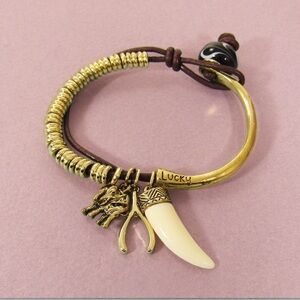 Bansri‎ Lucky Charm Bracelet Gold Coil Leather Elephant, Wishbone & Tusk Pendant